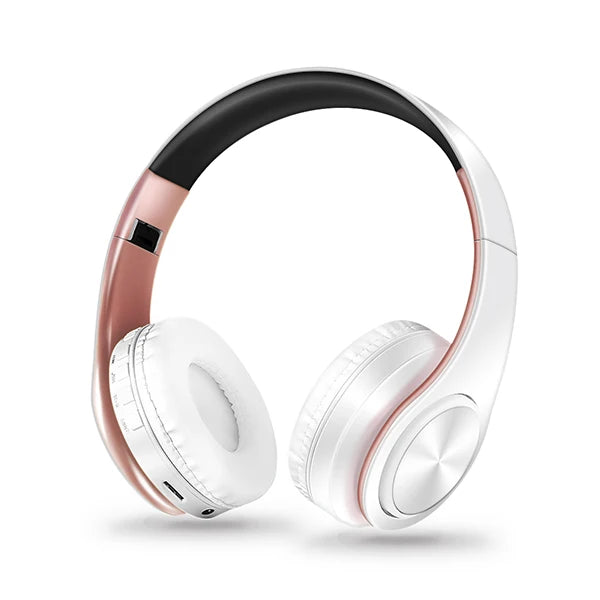 White headphones with rose gold accents on a white background