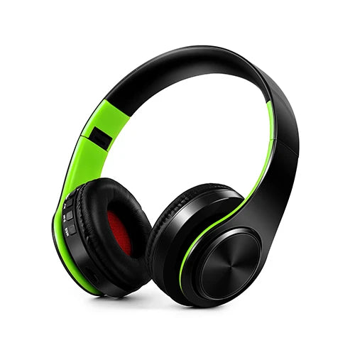 Black and green headphones on a white background
