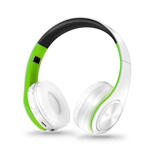 White and green headphones on a white background