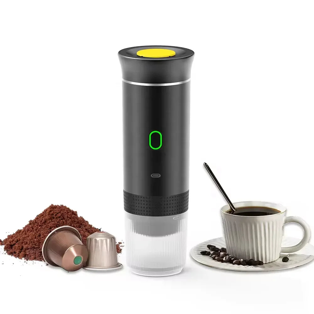 Black portable coffee maker with a cup of coffee and coffee beans on a white background
