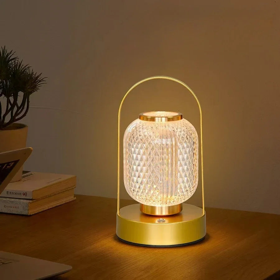 Decorative table lamp with geometric design on a wooden surface.