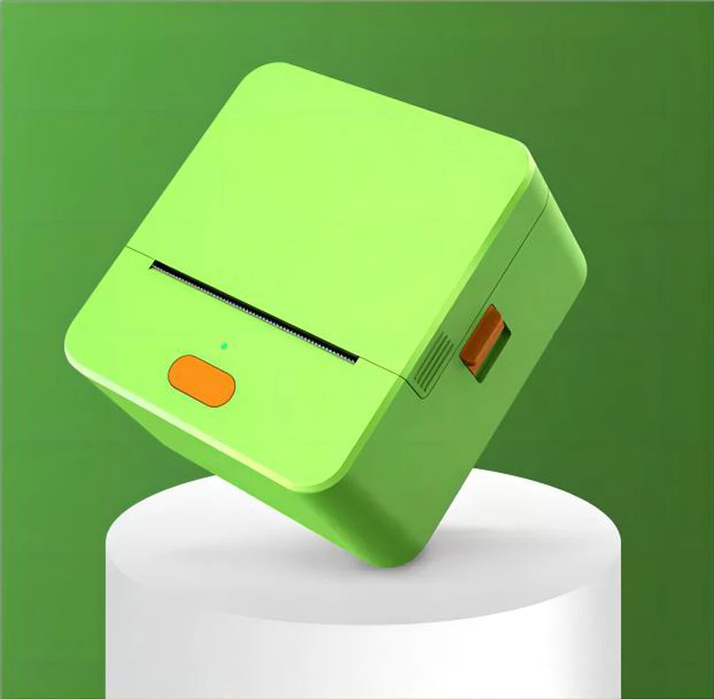 Green electronic device with orange button on a white stand against a green background