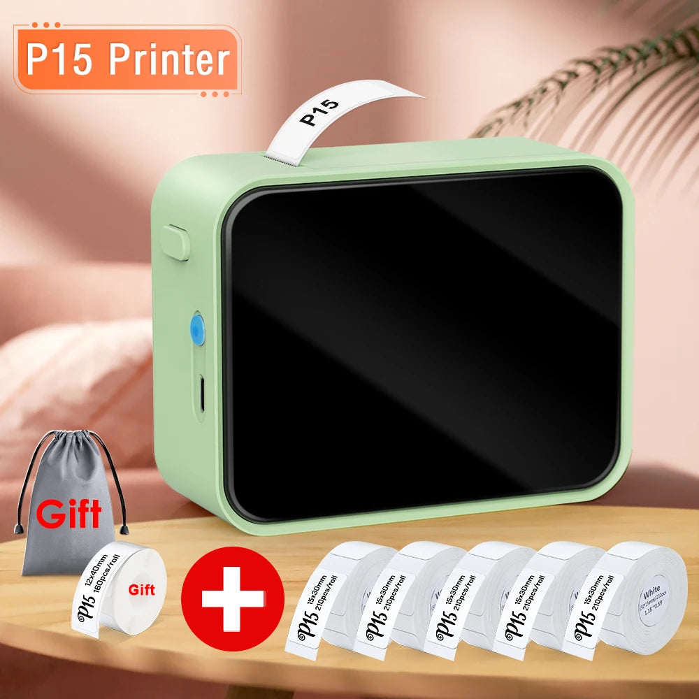 Green P15 printer with gift bag and rolls of paper on a wooden surface