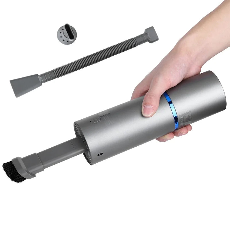 Handheld vacuum cleaner with attachments on a white background