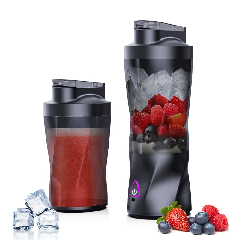 Two black shakers with red smoothie and berries on a white background