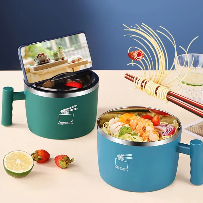 Two green and blue containers with food on a table with a blue background